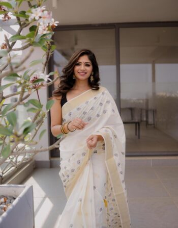 Twinkling and Black Cotton Embroidered Saree